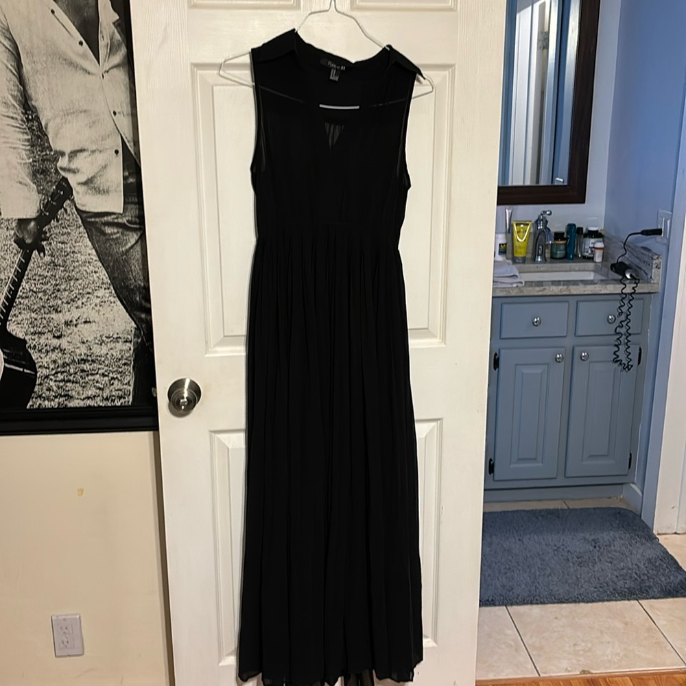 Women’s Forever 21 long sheer black dress.